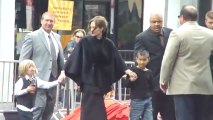 Angelina jolie and brad pitt leave the kung fu panda 2 premiere with their children