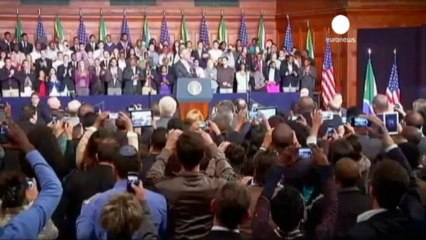 Obama 'deeply humbled' by trip to Mandela prison