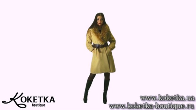 KOKETKA BOUTIQUE -Расклешенное пальто бежевого цвета с широким кожанным поясом.