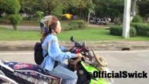 Pet Parrot Flies Along with Lady on Scooter