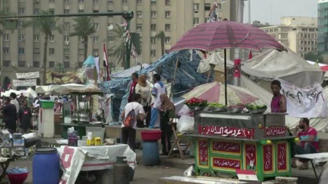 Egyptians continue protests as Morsi vows to stay on