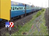 Iron rods fall on railway track