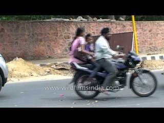 Sikh family in Safdarjung Enclave go three to a motorcycle