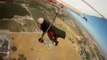 Hang glider in rapid descent struggles to release parachute
