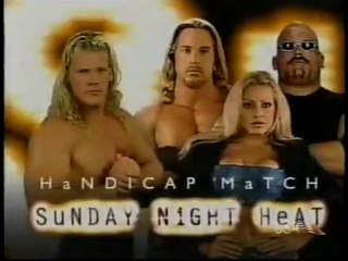 Chris Jericho vs. Test & Albert w/Trish Stratus