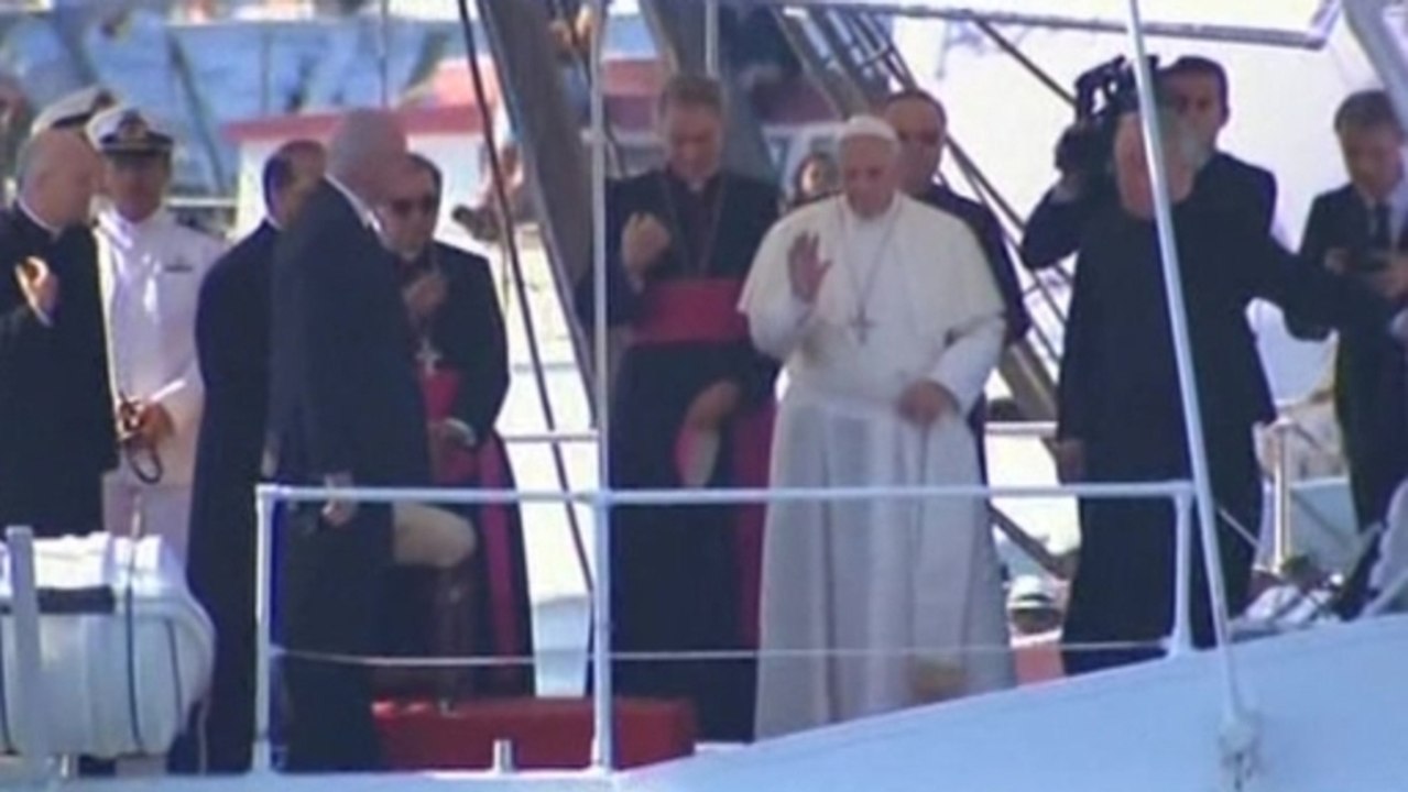 Pope Francis visits Lampedusa on his first offi...