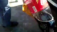 Cleaning a rusty bumper with Coca-Cola