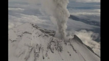Mexico's navy flies over roaring volcano as it spews plumes of ash and smoke
