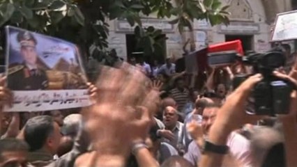 Crowds mourn policeman killed in Cairo clashes