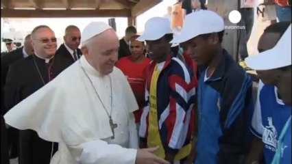 Migrants flood to Lampedusa - a day after Pope Francis...