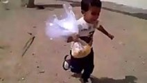 Little boy chased by hungry chickens