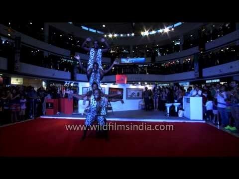 Massive gathering of people to watch the performance of African Acrobats