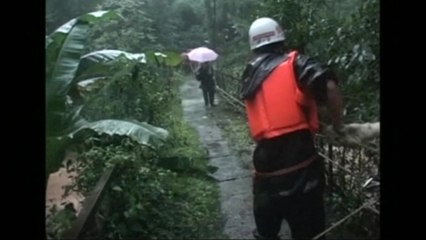 At least 30 buried by landslide in China