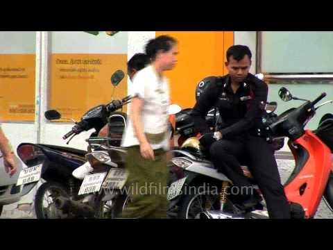 Pink taxis and motorcycle-borne cops: Bangkok