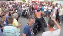 A biker falls in front of the crowd... Shame