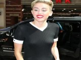 Miley Cyrus Forgets To Wear A Bra