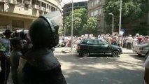 Riot police block Mursi supporters from marching on Tahrir Square