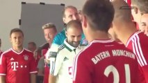 Pep Guardiola is hit accidentally by Tom Starke at photo shooting FC Bayern 2013