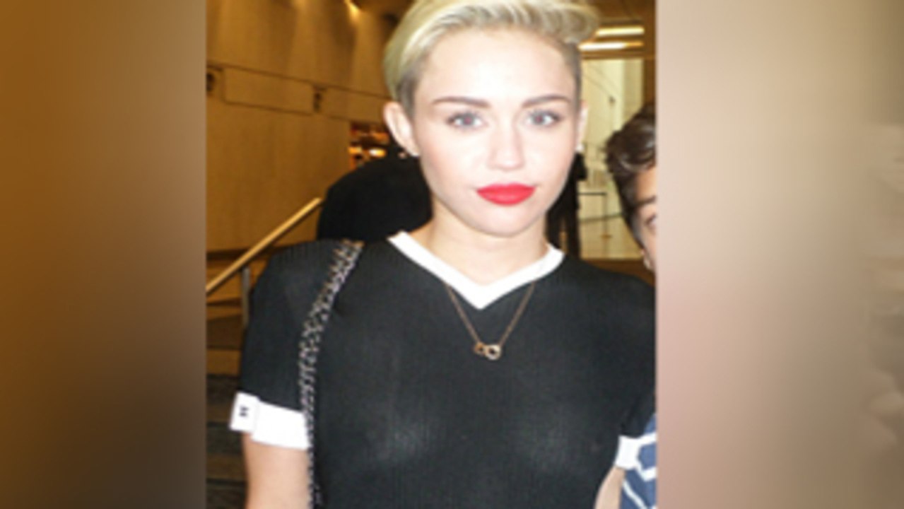 Miley Cyrus Caught Braless