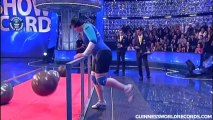 Fastest time to lift 4 Atlas stones (female) - Guinness World Records Classics