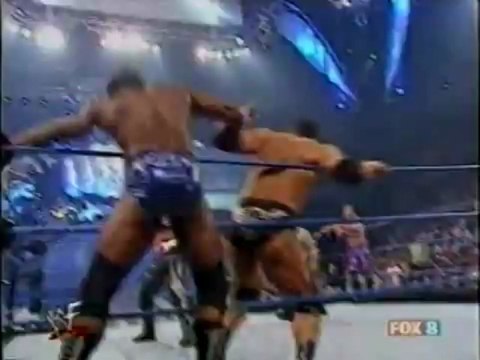 Test & Booker T vs. The Rock & Chris Jericho (WWF Tag Team Championship)