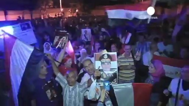 Rival protesters hold pro-Mursi and pro-army rallies in...