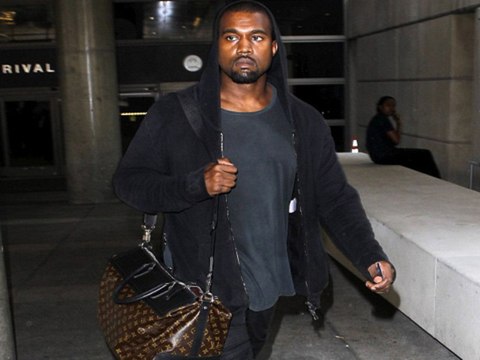 Caught On Cam- Kanye West Attacks A Paparazzi In LA