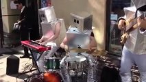 Robot musicians perform Daft Punk hits on street