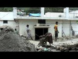 Localites rebuilding their houses after Uttarakhand flood