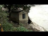 A house completely destroyed by floods in Rudraprayag