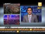الجانب الأخر: الطائرات الحربية تحلق فى سماء الأسكندرية وتلقى أعلام مصر على المتظاهرين