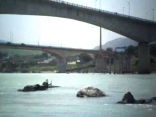 boy in the mid of river indus attock
