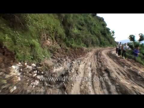 Heavily damaged roads on the way to Guptkashi