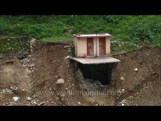This house in Uttarakhand hangs off a cliff, the road below it having fallen into the Ganga