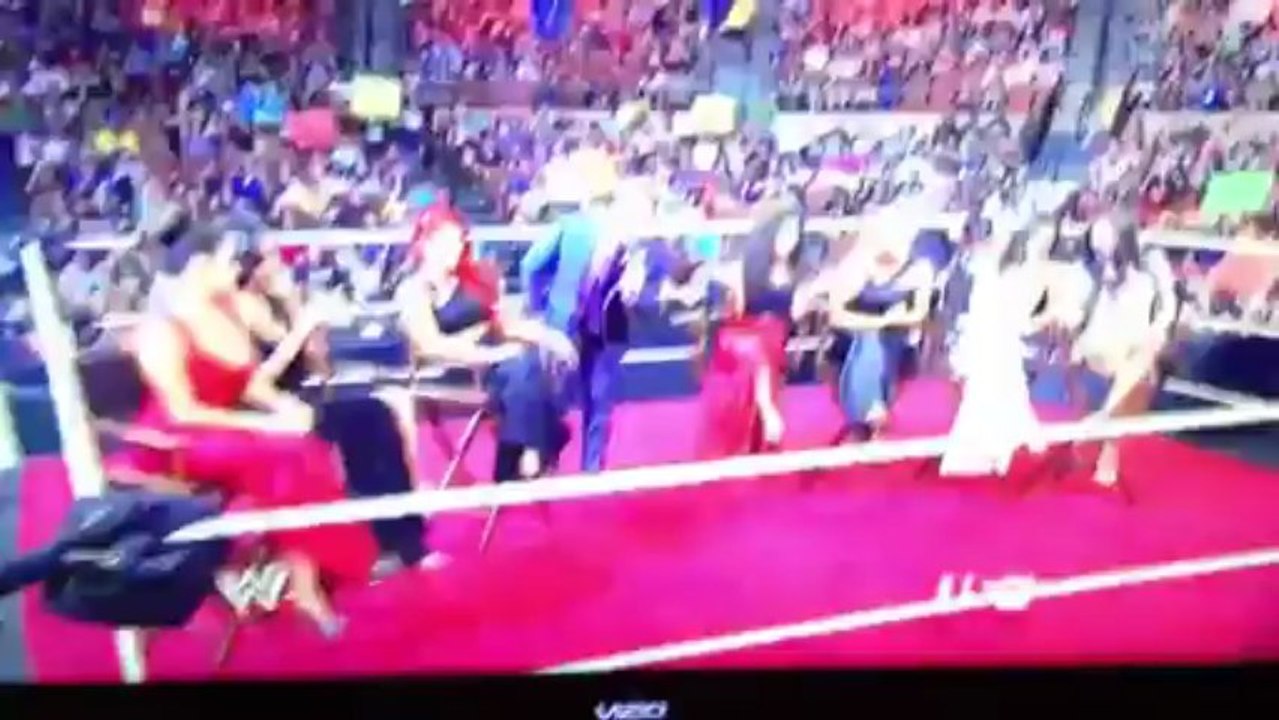 Brie Bella's boob pops out