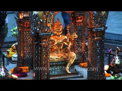 Gold Brahma statue at Erawan shrine, Bangkok