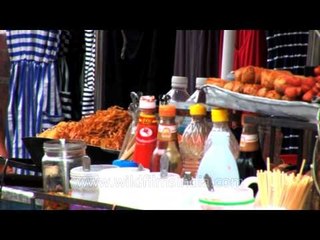 Woman selling chinese food in Bangkok