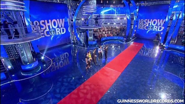 Fastest 20 m duck walk carrying 120 kg - Guinness World Records Classics