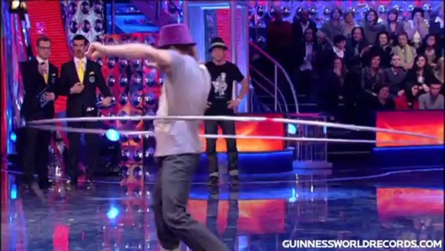 Giant hula hoop, most rotations in a minute - Guinness World Records Classics