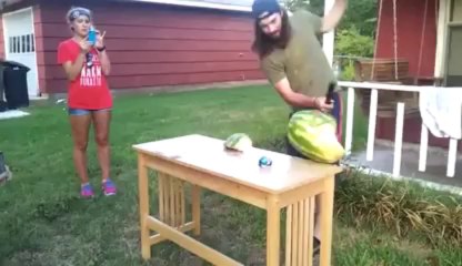 Cut his hand with a big knife trying to cut a watermelon! FAIL