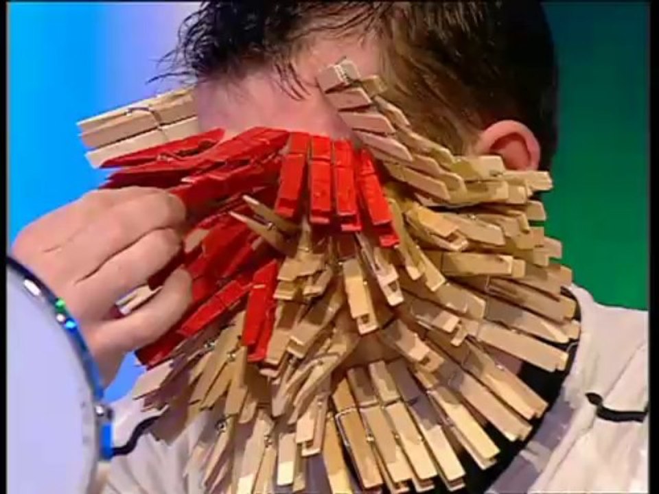 Most Clothes Pegs Clipped on Face