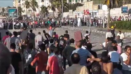 Tải video: Morti e feriti in Egitto negli scontri tra pro e anti-Morsi