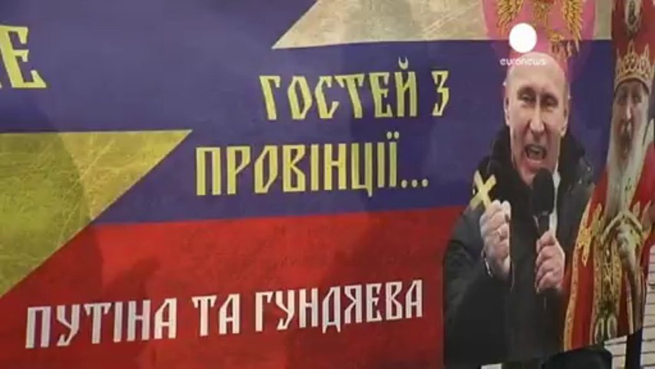 Putin visits Ukraine to mark region's conversion to...