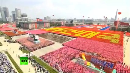 Awesome Parade pageantry in Pyongyang N. Korea. A real choregraphy!