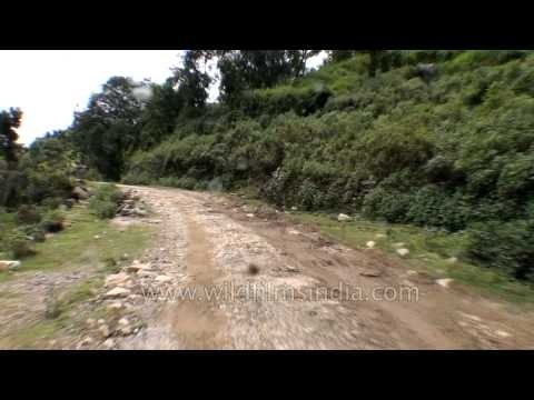 Driving on the damaged roads of Guptkashi