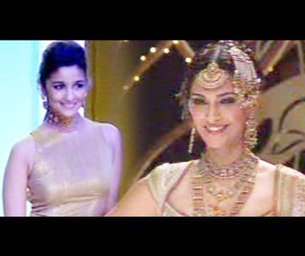 Bollywood actresses walk the ramp at a fashion show