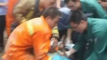 Child trapped under collapsed house in east China
