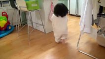 Cute Korean girl runs from her daddy