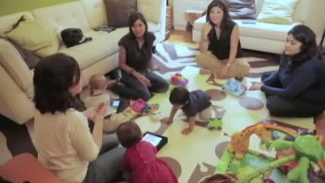 Parents entertain babies with iPads
