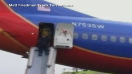 Plane nose dives into runway